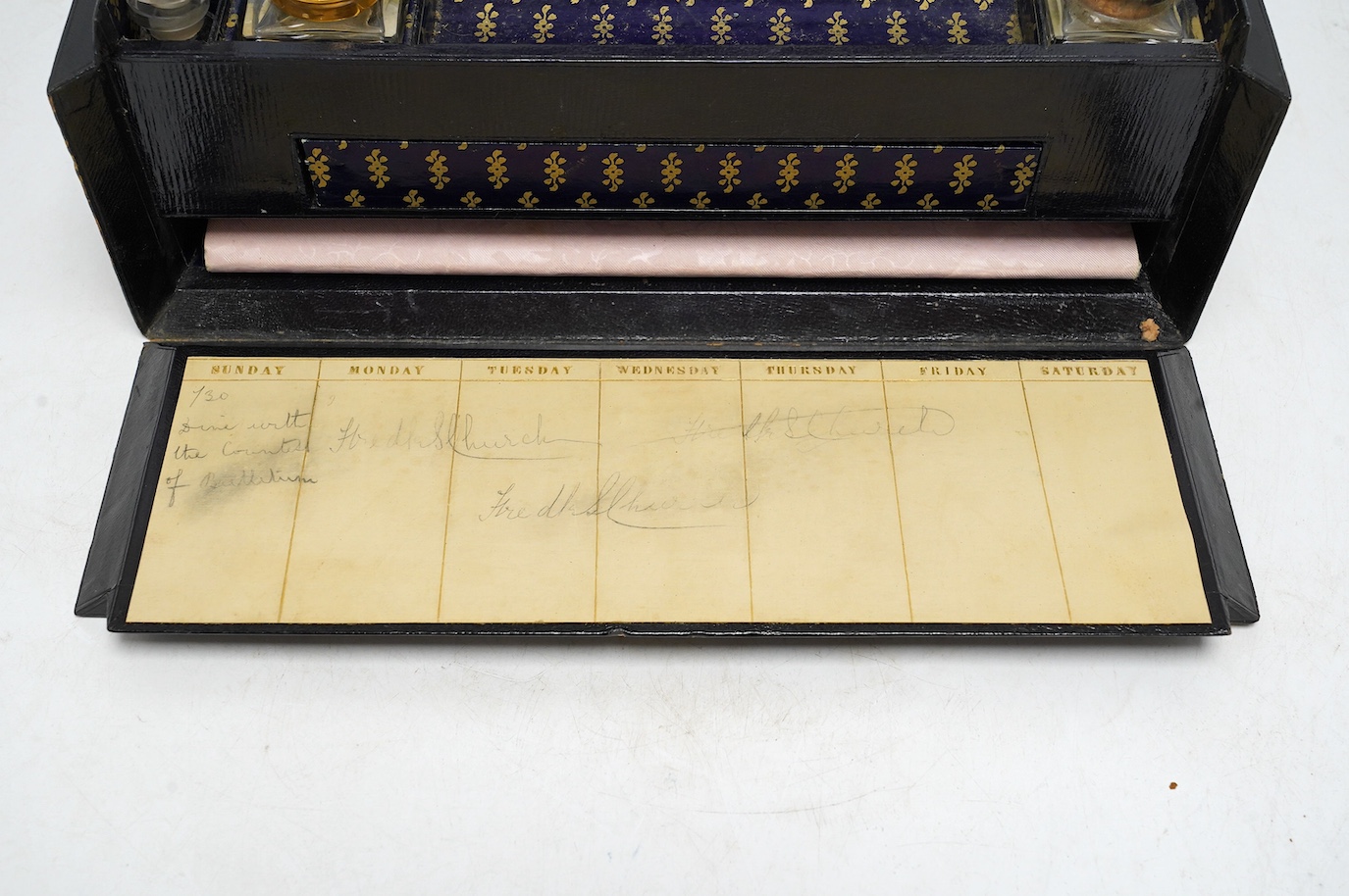 A Victorian black Moroccan leather paper lined and fitted writing box, with some implements, 30cm x 12.5cm. Condition - fair